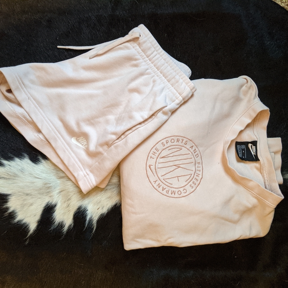 XS Nike shorts in a baby pink color